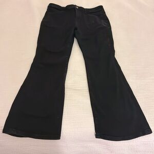 Pilcro black boot cut denim jeans, size 32, slightly faded from Anthropologie
